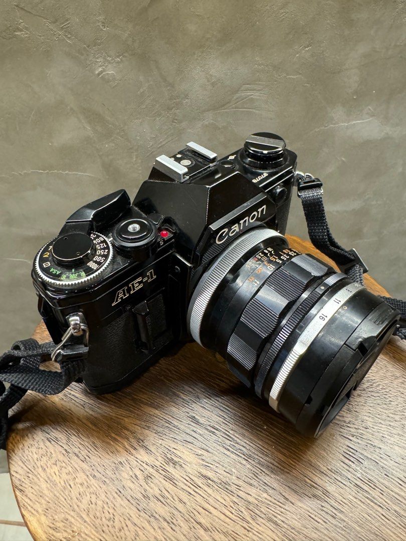 Canon AE-1 35mm (Category: Cameras) located in Makati City. Submitted by yukkini (Listing ID 1325717244, Image 3). Description: Canon AE-1 Film. Bought second hand. With lens cap. 35mm lens. Rfs: Decluttering.