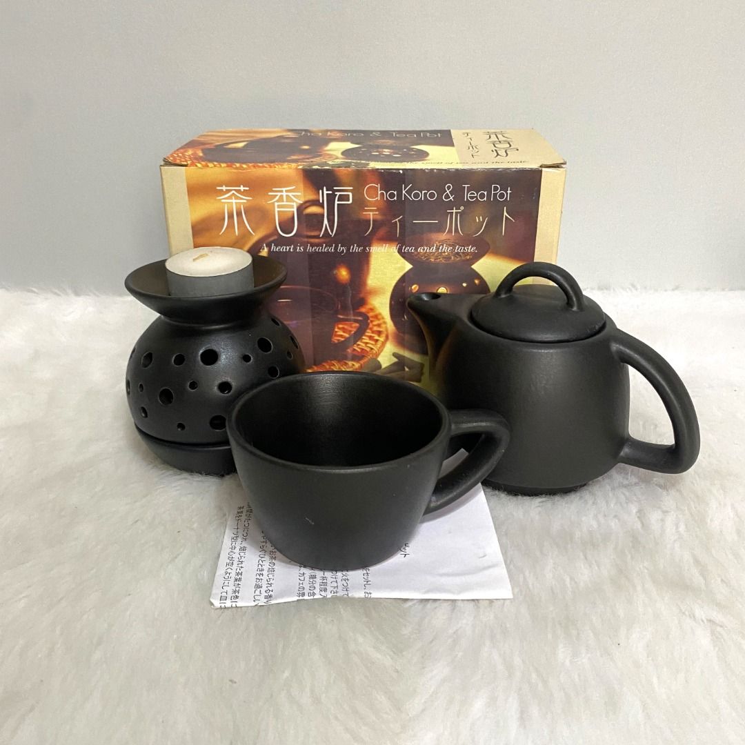 Cha Koro & Teapot Black Teapot Candle Holder Set (Category: Coffee & Tea Tableware) located in Consolacion. Submitted by posh_avenue_home (Listing ID 1325756973, Image 1). Description: New with box. From Japan. P450 per set. 2 sets available..