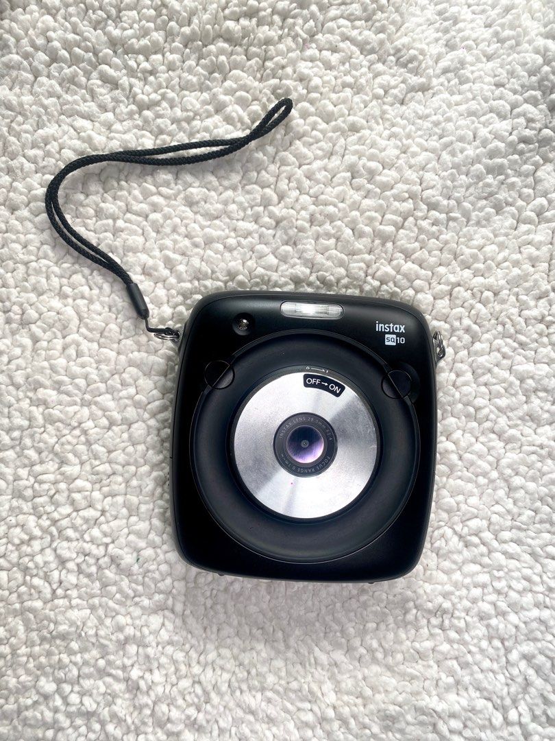 Fujifilm Instax SQUARE SQ10 (Category: Cameras) located in Angeles City. Submitted by alex_gonzaga (Listing ID 1325710537, Image 3). Description: Fujifilm Instax SQUARE SQ10 - In SUPER MINT CONDITION - No signs of Tear and Wear - Rarely Used INCLUSION: - Camera -Camera Box with complete manuals -USB to Micro USB cable (Charger) -NO adapter -32 GB micro SD card Rfs: Decluttering .