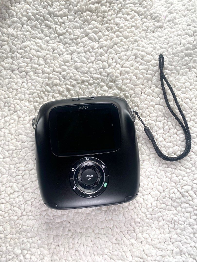 Fujifilm Instax SQUARE SQ10 (Category: Cameras) located in Angeles City. Submitted by alex_gonzaga (Listing ID 1325710537, Image 2). Description: Fujifilm Instax SQUARE SQ10 - In SUPER MINT CONDITION - No signs of Tear and Wear - Rarely Used INCLUSION: - Camera -Camera Box with complete manuals -USB to Micro USB cable (Charger) -NO adapter -32 GB micro SD card Rfs: Decluttering .