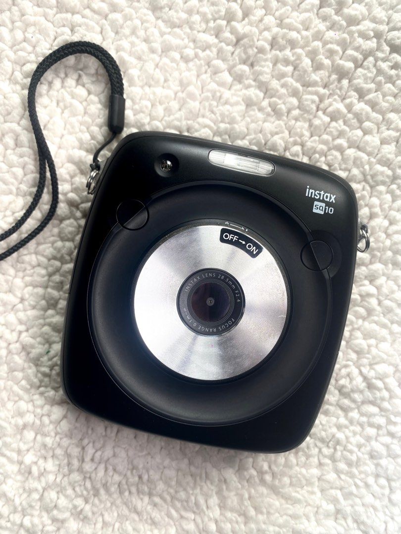 Fujifilm Instax SQUARE SQ10 (Category: Cameras) located in Angeles City. Submitted by alex_gonzaga (Listing ID 1325710537, Image 1). Description: Fujifilm Instax SQUARE SQ10 - In SUPER MINT CONDITION - No signs of Tear and Wear - Rarely Used INCLUSION: - Camera -Camera Box with complete manuals -USB to Micro USB cable (Charger) -NO adapter -32 GB micro SD card Rfs: Decluttering .