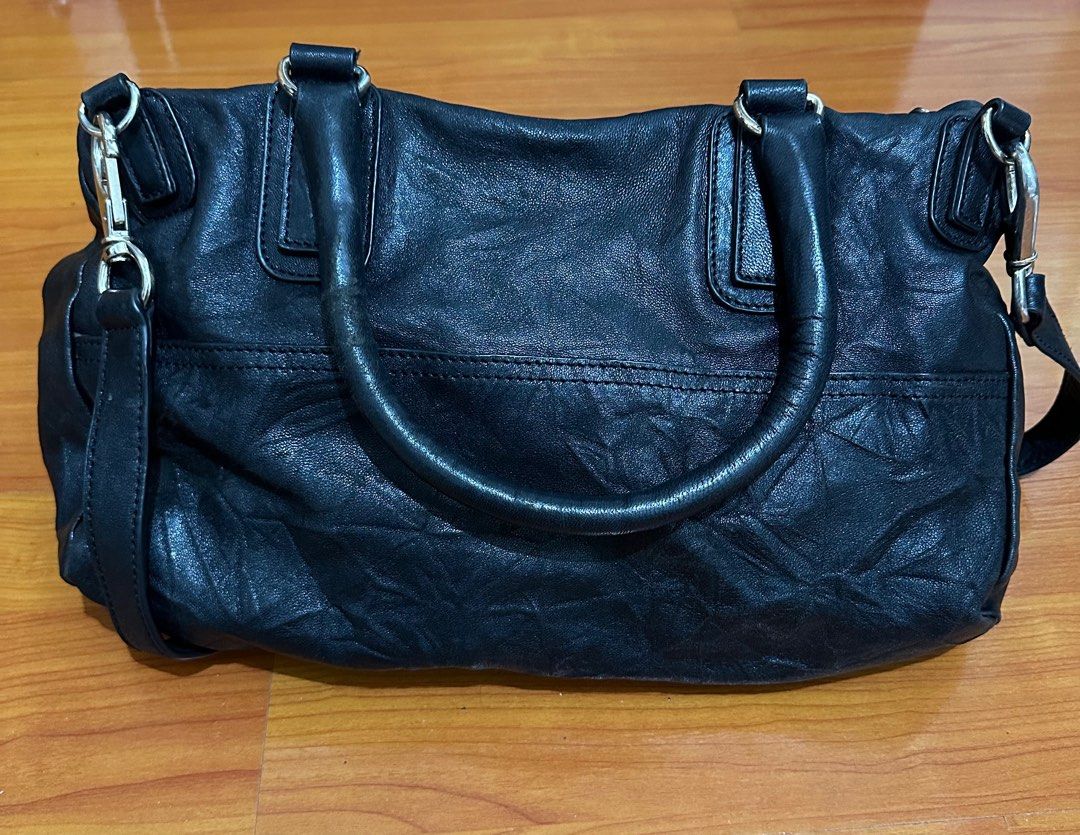 Givency Bag (Category: Luxury Bags & Wallets) located in Makati City. Submitted by sheeca (Listing ID 1325647035, Image 3). Description: Givency bag Used and with some flaws. Selling it because I need to declutter and Im also not using it any longer..