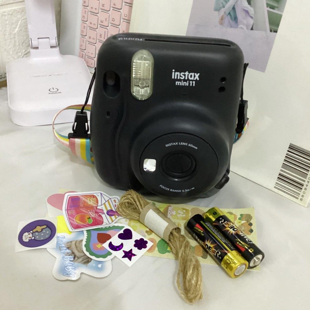 Instax Mini 11 Black (Category: Cameras) located in Rosario. Submitted by shairamitch (Listing ID 1325735527, Image 1). Description: 📸 INSTAX Mini 11 - Charcoal Black ✅ COD VIA LALAMOVE 💸 From ₱3,500 to ₱3,000 na lang LIKE NEW: lady owned, walang scratches or dirt INCLUSIONS: unit, strap, new batteries, deco materials ✨ 📍 Buendia Pasay.
