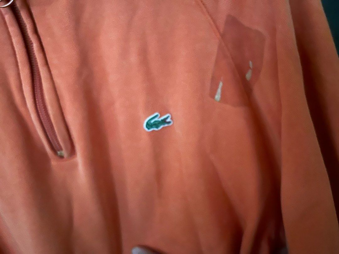Lacoste sweater (Category: Coats, Jackets and Outerwear) located in Malabon City. Submitted by everythinggoeson (Listing ID 1325754978, Image 2). Description: orange with flaws need wash FREE SHIPPING through jnt within metro manila only.