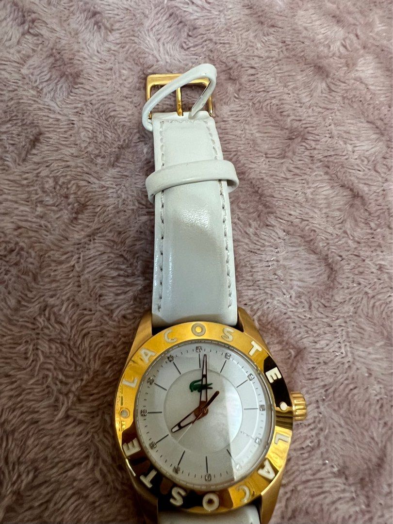 Lacoste Wrist Watch - White & Gold (Category: Women's Watches) located in Taguig. Submitted by sharvs_vsv (Listing ID 1325741763, Image 2). Description: Authentic from US. With minor flaw (see photo) Used twice..
