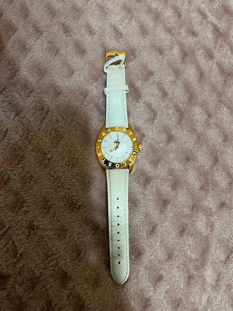 Lacoste Wrist Watch - White & Gold (Category: Women's Watches) located in Taguig. Submitted by sharvs_vsv (Listing ID 1325741763, Image 1). Description: Authentic from US. With minor flaw (see photo) Used twice..