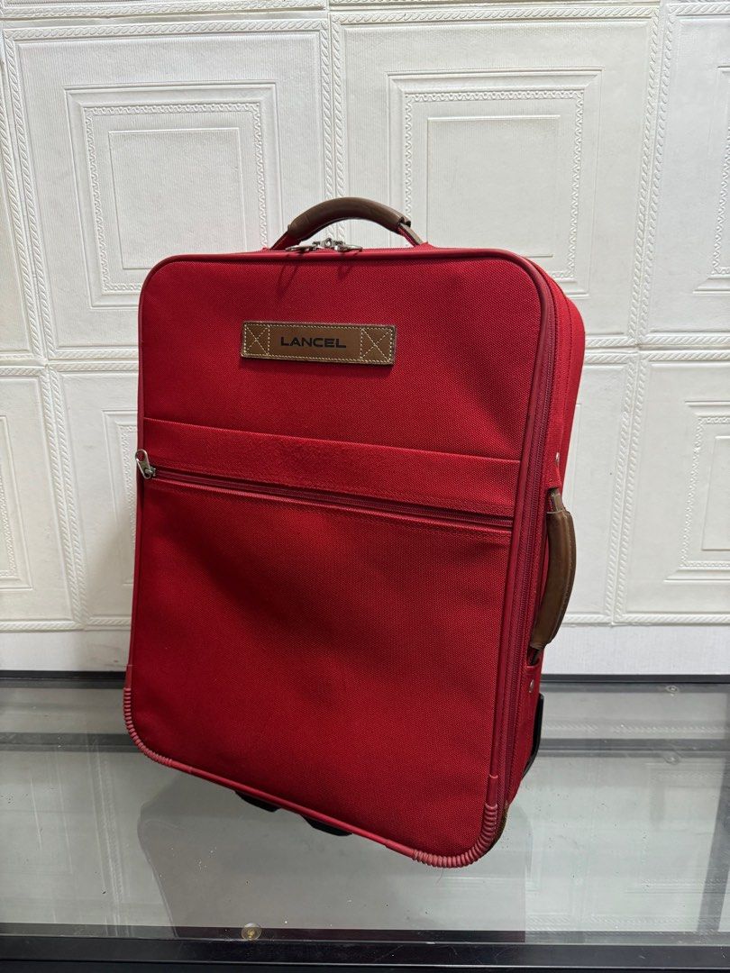 Lancel 2 wheels travel bag (Category: Luxury Bags & Wallets) located in Rizal. Submitted by houseofbell (Listing ID 1325746172, Image 2). Description: 20x15.5 inches.