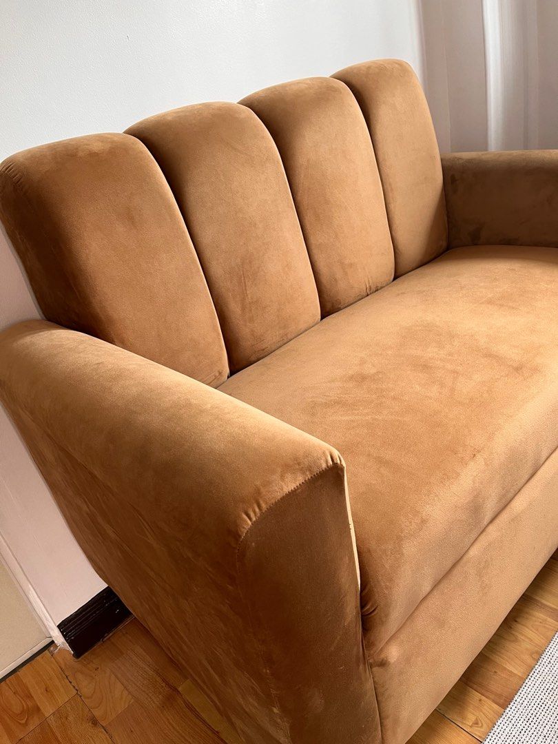 Light Brown Two Seater Scallop Sofa (Category: Sofas) located in Las Pinas. Submitted by abby_e_g (Listing ID 1313272388, Image 2). Description: Available 2 Seater Scallop Sofa L44 x W26 x H32 inches Velvet Light Brown Steel Legs Classic Uratex Foam Lalamove/Pick up by the buyer Gcash/ BT payment .