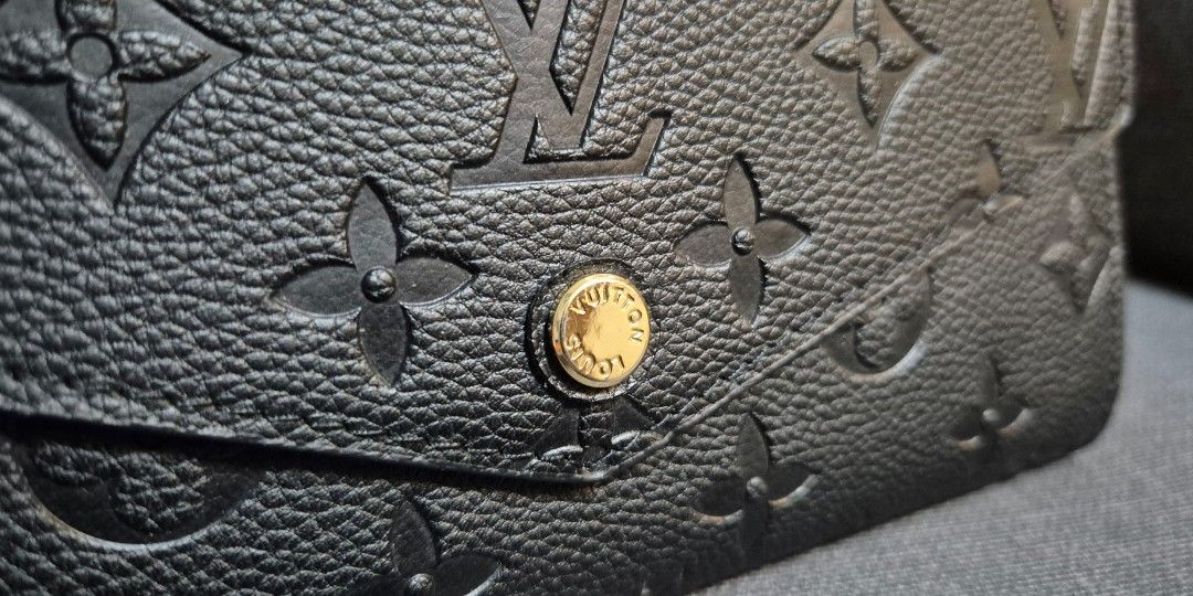 LV Wallet in Empreinte (Category: Luxury Bags & Wallets) located in Quezon City. Submitted by mustlovepreloved (Listing ID 1325775479, Image 3). Description: Medium-sized wallet Black Empreinte Payment via Gcash or BPI bank transfer. Lalamove or Grab shipping within Metro Manila - 10AM to 2PM daily J&T shipping for outside Metro Manila addresses. I ship every Wednesdays and Saturdays..