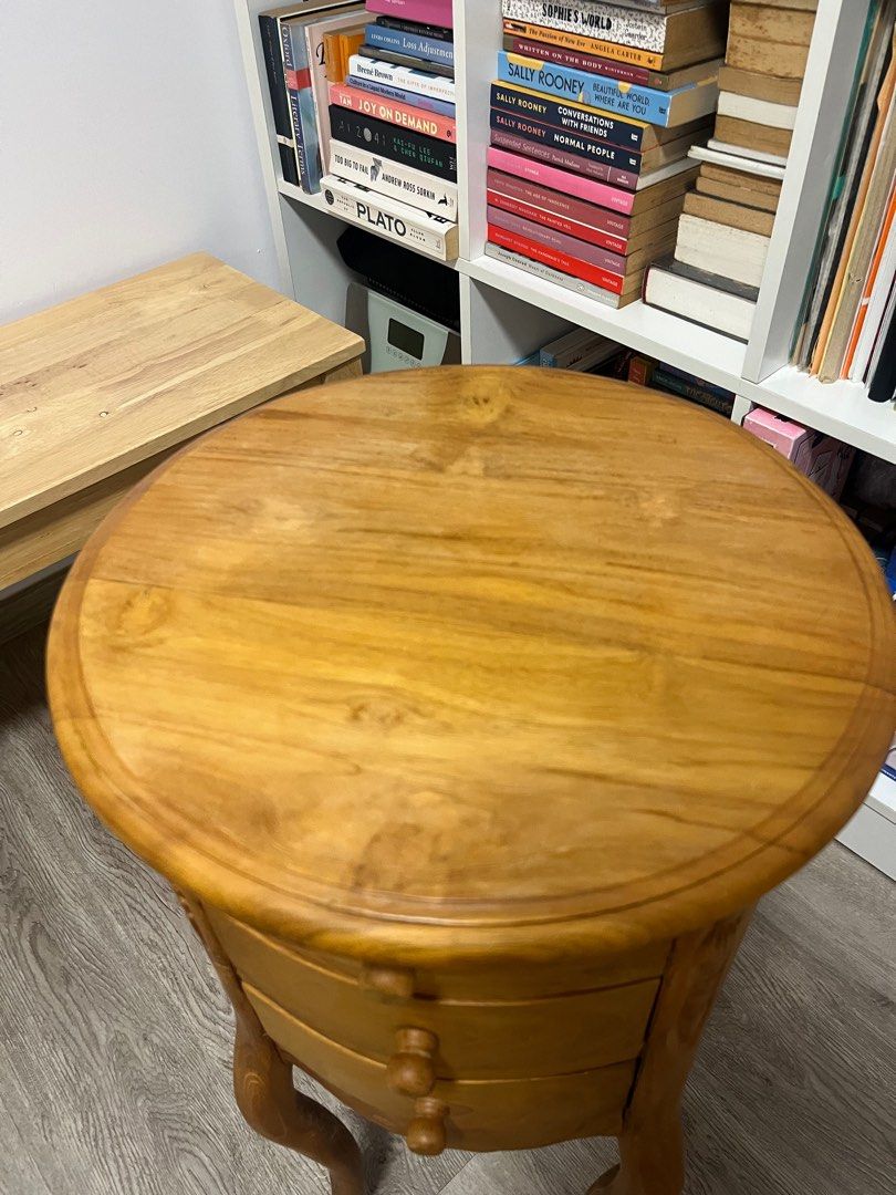 Solid Teak Side Table (Category: Other Home Furniture) located in Singapore. Submitted by shewaxedlyrical (Listing ID 1325753005, Image 3). Description: Solid teak side table in very good condition. Letting go for cheap because we’re moving. Self collection at Bedok North Road. Height 72cm Width 34cm.
