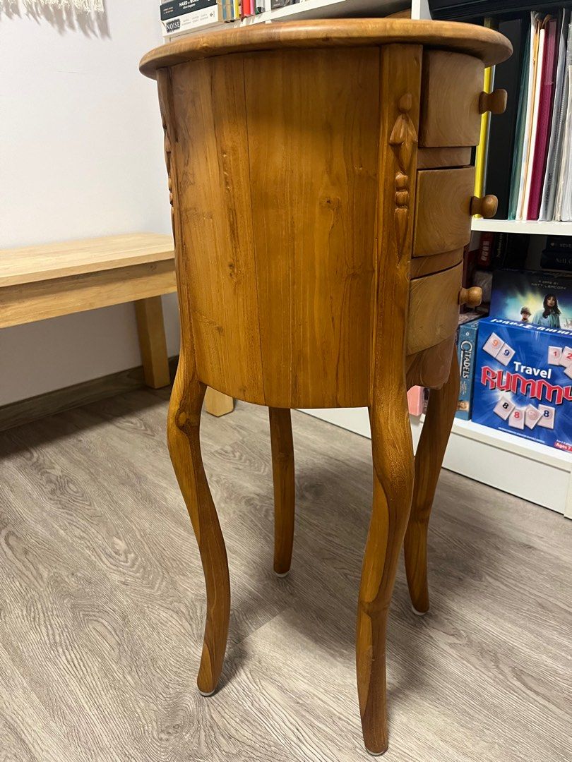 Solid Teak Side Table (Category: Other Home Furniture) located in Singapore. Submitted by shewaxedlyrical (Listing ID 1325753005, Image 2). Description: Solid teak side table in very good condition. Letting go for cheap because we’re moving. Self collection at Bedok North Road. Height 72cm Width 34cm.