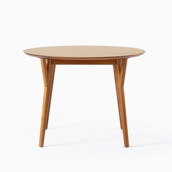 West Elm Mid-Century Rounded Expandable Dining Table (Category: Tables & Sets) located in Marikina City. Submitted by juliar17 (Listing ID 1325672931, Image 2). Description: - Mid-Century Rounded Expandable Dining Table - West Elm - 42” upto 80” - Wooden - Has light scratches but still good condition.
