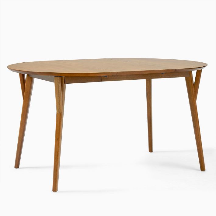 West Elm Mid-Century Rounded Expandable Dining Table (Category: Tables & Sets) located in Marikina City. Submitted by juliar17 (Listing ID 1325672931, Image 1). Description: - Mid-Century Rounded Expandable Dining Table - West Elm - 42” upto 80” - Wooden - Has light scratches but still good condition.