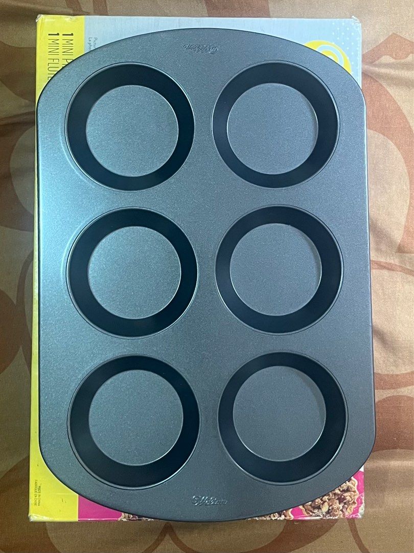WILTON 6-Cavity Mini Pie Pan (Category: Bakeware) located in San Jose del Monte. Submitted by thess_garcia (Listing ID 1325664114, Image 1). Description: WILTON 6-Cavity Mini Pie Pan Dimensions: 42 cm x 28.5 cm Never been used RFS: doesn’t fit my oven .