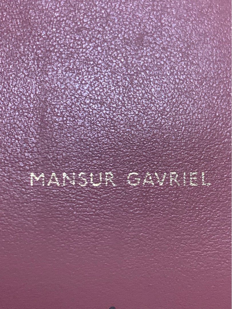 Authentic Mansur Gavriel Mini Bucket Blush Bag (Category: Luxury Bags & Wallets) located in Rosario. Submitted by myvinatgepieces (Listing ID 1325945928, Image 3). Description: Authentic Excellent Used Condition Minimal signs of wear at bottom edges / opening lips No stains/ holes/ color transfer Clean Interior Blush Color Cow Leather Dimensions: 9.5”H x 8”W x 4.5”D Made in Italy No Inclusions A mini version of Mansur Gavriel’s iconic bucket bag,