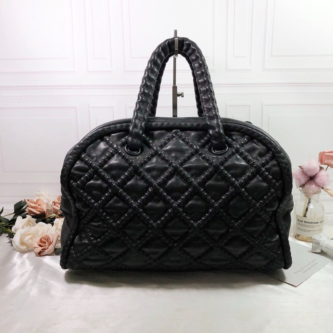 Chanel Hidden Chain Bowler Bag in Black Lambskin, Luxury, Bags ...