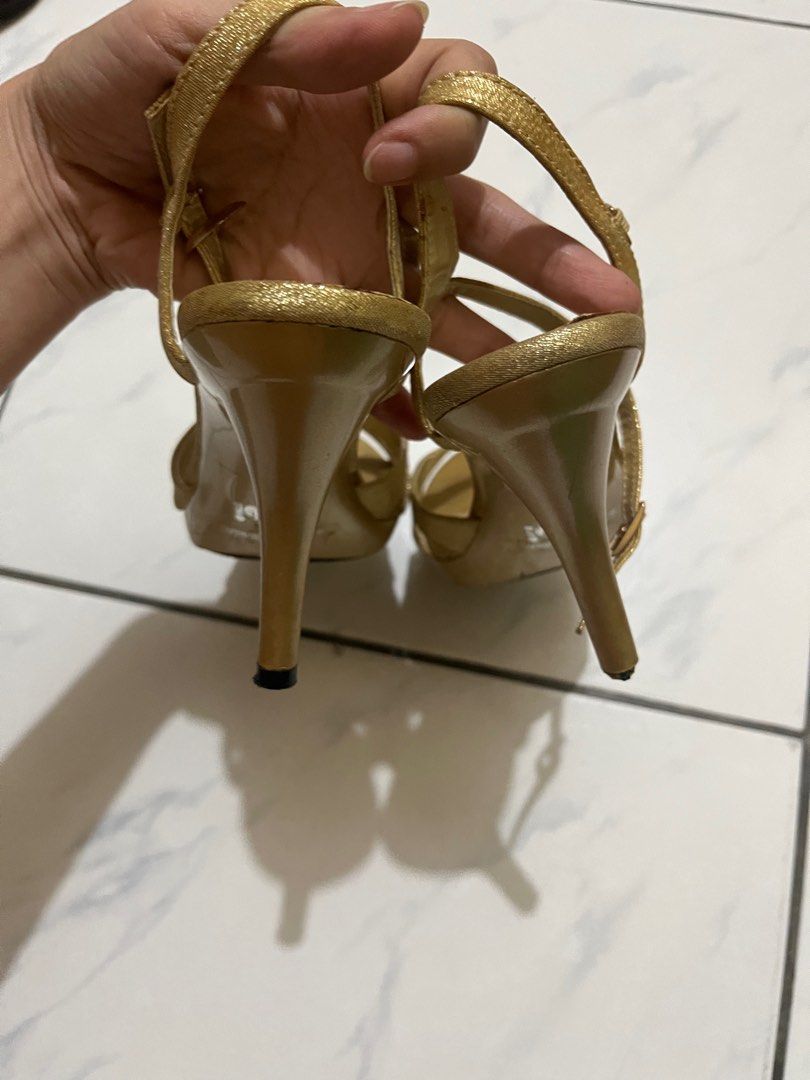 Gibi gold stiletto (Category: Heels) located in Cavite. Submitted by teamhd (Listing ID 1325969190, Image 3). Description: Gibi collection Size 5 Broken right heel but easy to be fixed.