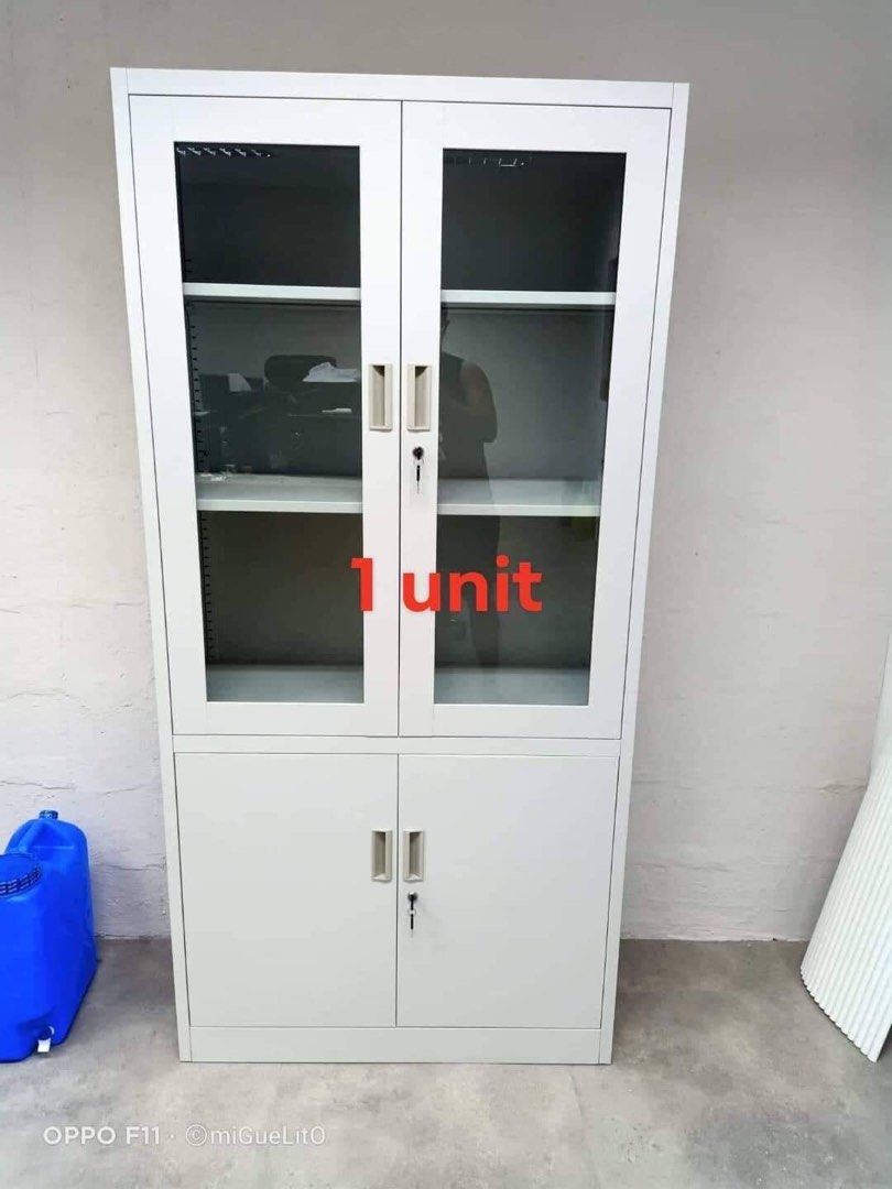 Half glass half door Multi purpose Metal cabinet (Category: Shelves, Cabinets & Racks) located in Manila. Submitted by shelvesanddisplay (Listing ID 1325862646, Image 3). Description: Size: 1850mm height x 900mm width x 400mm depth Color: Light Gray Gauge 20 Shelves and Display Enterprises 1449 Pres. Quirino Ave. Paco Manila beside A Taste of Italy Landline 85625004 or 72156272 Cp# 09177268814 or 091772697.