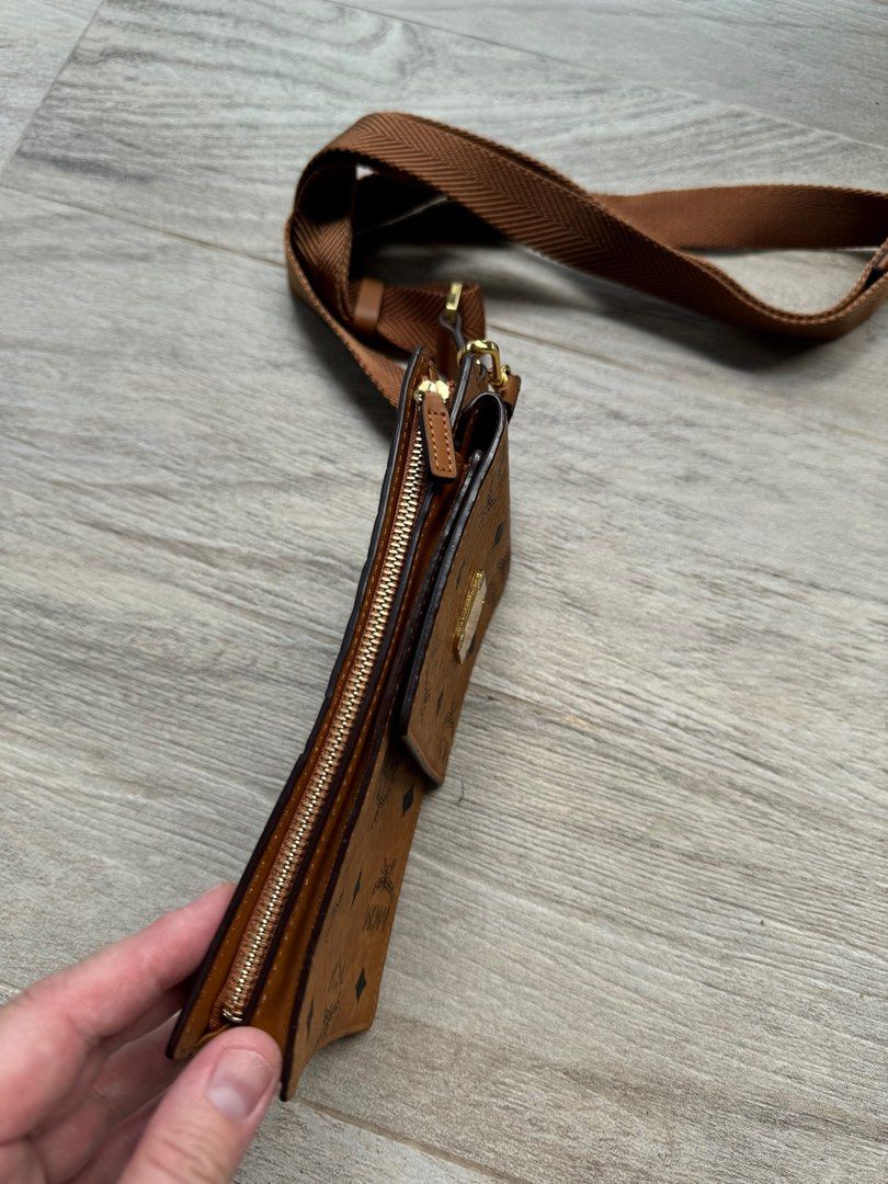 MCM Sling Bag (Category: Bags & Wallets) located in Singapore. Submitted by zolldoll79 (Listing ID 1325840662, Image 3). Description: Bought this but only used it 2 or 3 times. Realised I still prefer a bigger bag. In mint condition. .