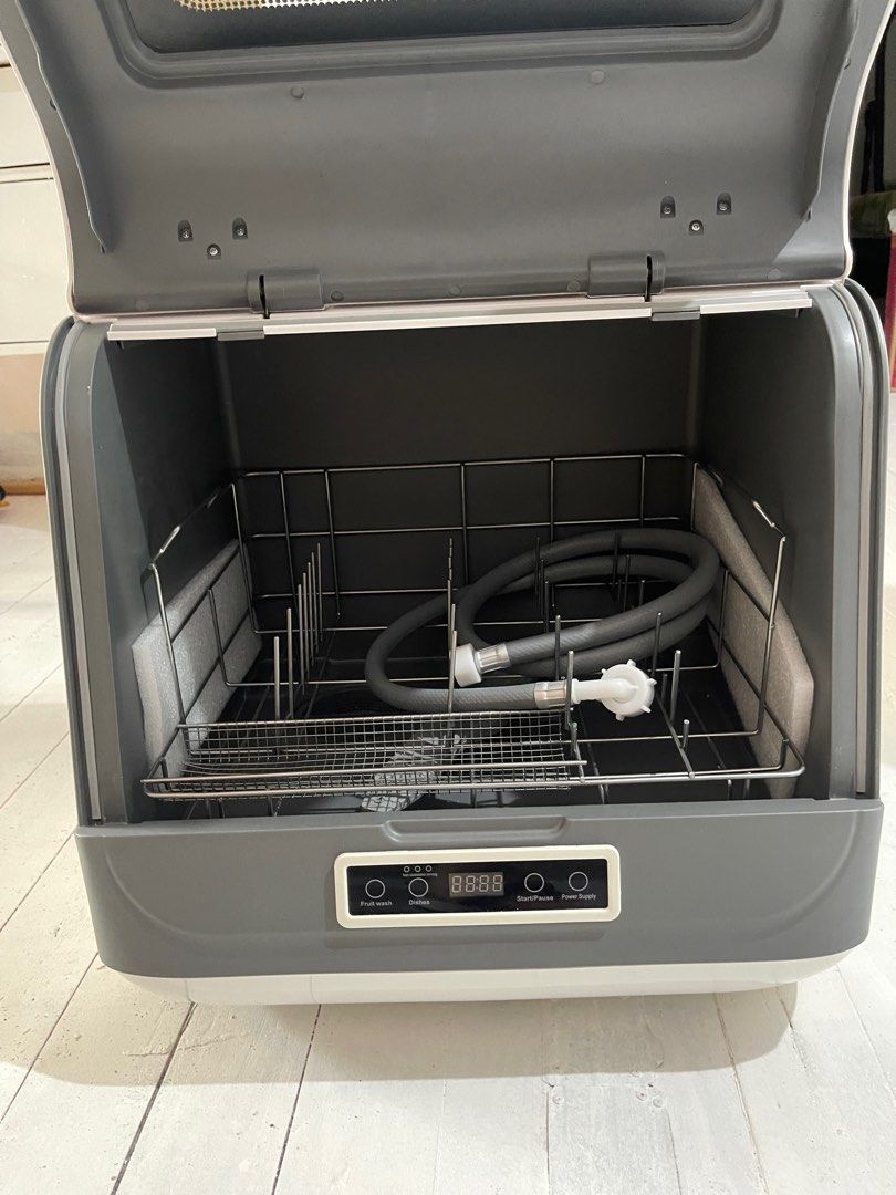 Mini Dishwasher (Category: Dishwasher) located in Manila. Submitted by vieecisco (Listing ID 1325812043, Image 2). Description: -Almost Brand New -Bought from Purple App last 2021 but never opened until this year to test -Opened only for testing -Works Well and Cleans Dishes -Hose Included -Dish Rack Included Can do meetup around Olongapo City, Zambales.
