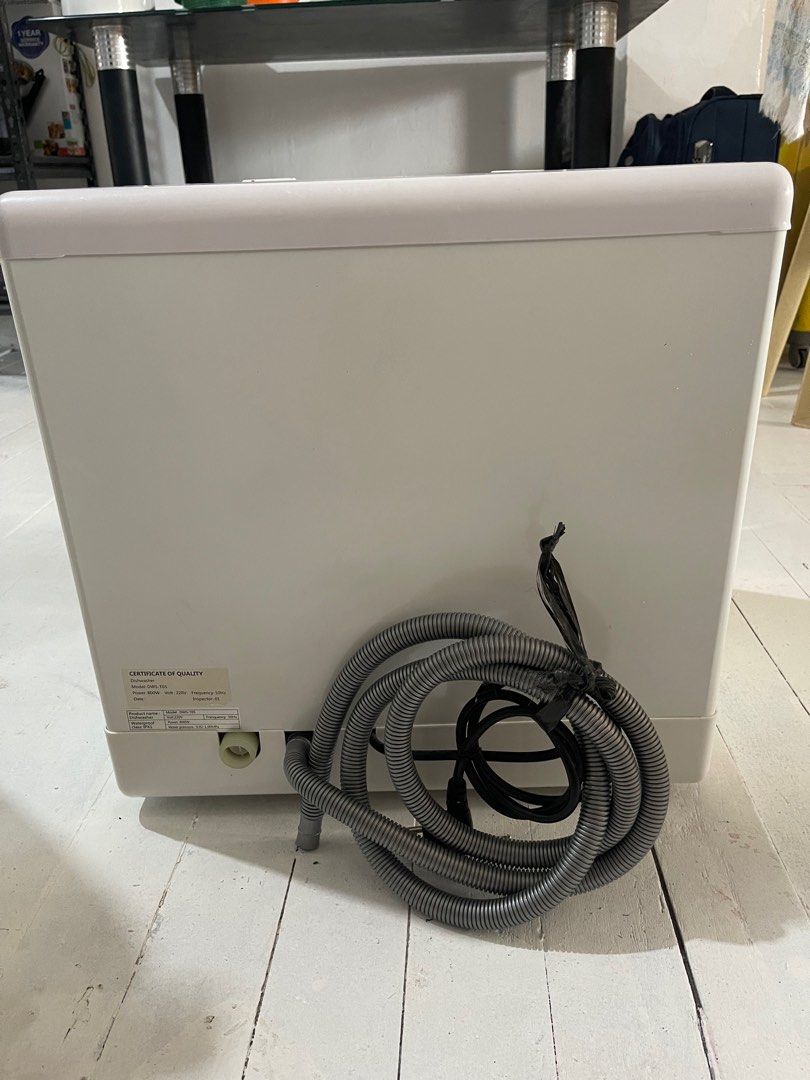 Mini Dishwasher (Category: Dishwasher) located in Manila. Submitted by vieecisco (Listing ID 1325812043, Image 3). Description: -Almost Brand New -Bought from Purple App last 2021 but never opened until this year to test -Opened only for testing -Works Well and Cleans Dishes -Hose Included -Dish Rack Included Can do meetup around Olongapo City, Zambales.