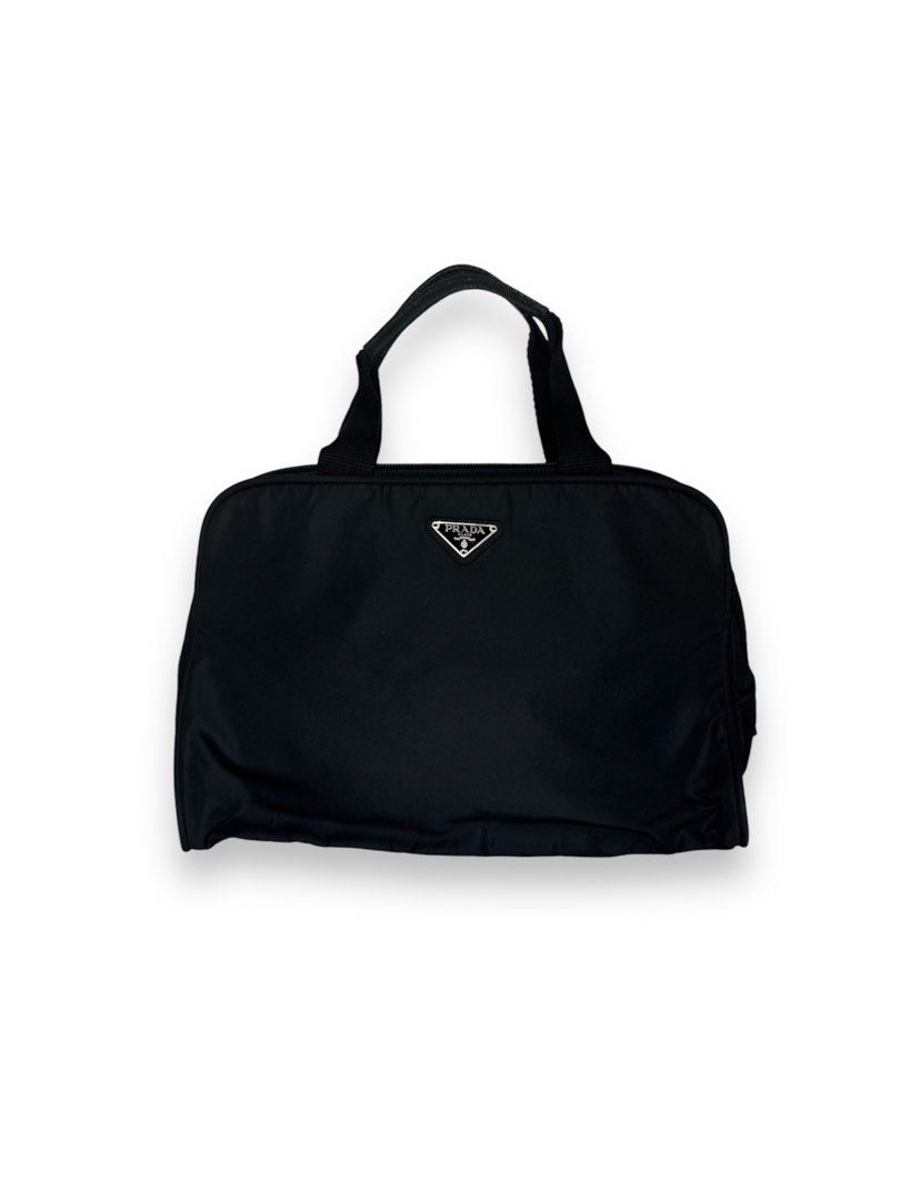 Prada handbag (Category: Luxury Bags & Wallets) located in Manila. Submitted by Qratedph.pieces (Listing ID 1325939360, Image 1). Description: Prada handbag Rank A-AB With key, cards Missing lock button 6.8k.