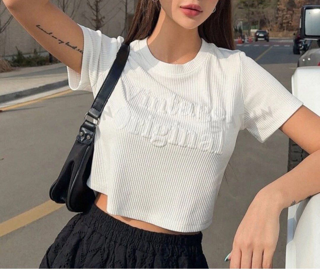 Ribbed Knit Cropped Tee (Category: Shirts) located in Cavite. Submitted by adiore (Listing ID 1325880563, Image 1). Description: stretchable fabric i usually wear size M but sized up for a comfier fit • shoulder: 14.6 inch • length: 17.7 inch • sleeve length: 7.1 inch • bust: 36.2 inch • cuff: 12.5 inch • bicep length: 13.7 inch.