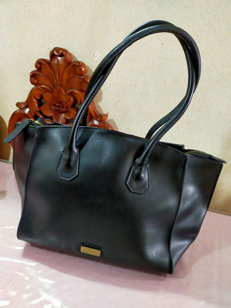 The Tannery Manila (Category: Luxury Bags & Wallets) located in Quezon City. Submitted by mcmp1216 (Listing ID 1325865460, Image 1). Description: Pre-owned Black Leather Price negotiable.