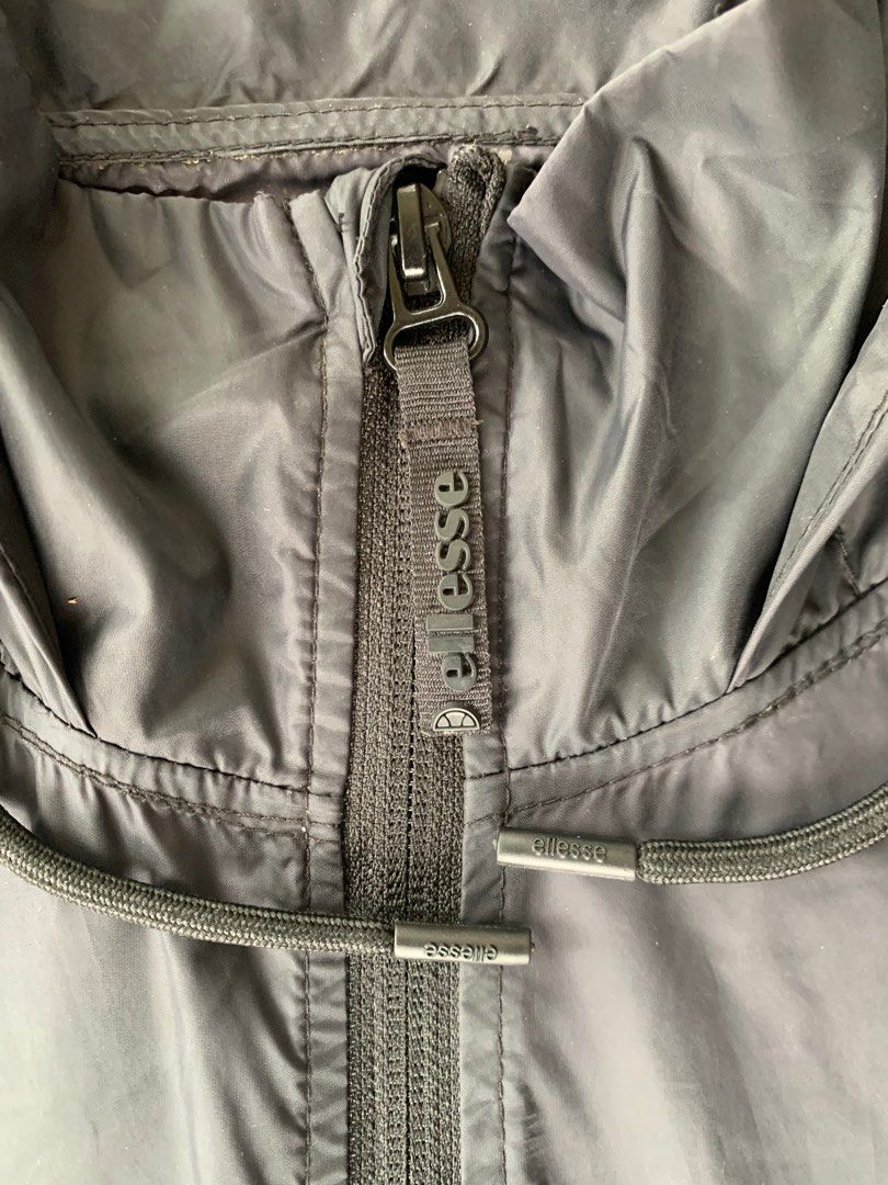 ellesse ion overhead reflective logo halfzipper anorak windbreaker Men s Fashion Coats Jackets and Outerwear on Carousell