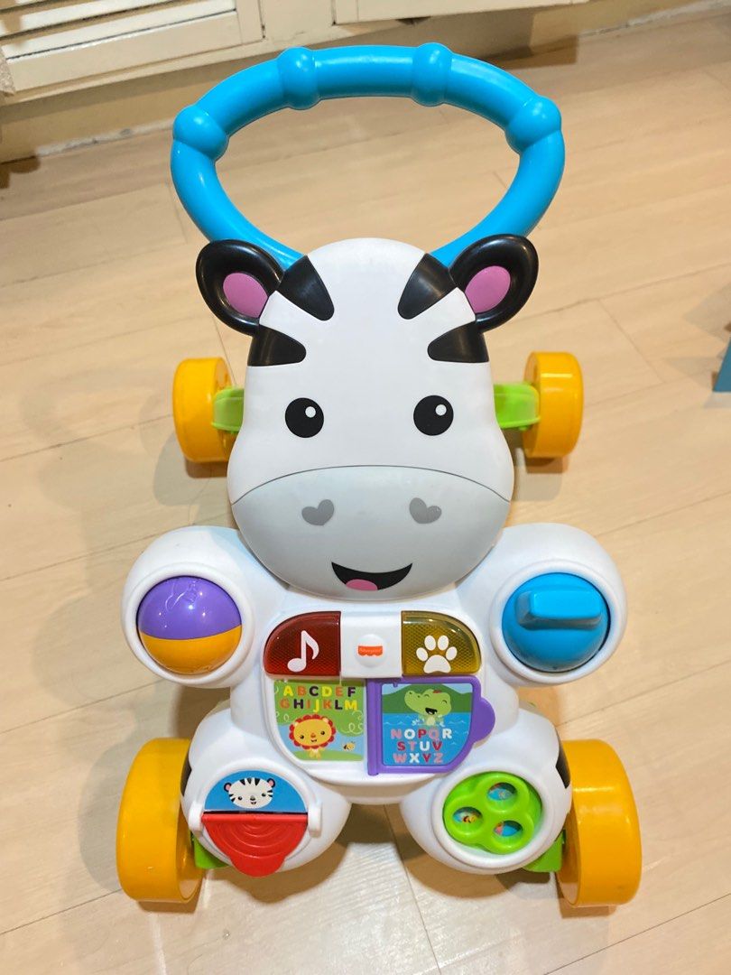 Fisher Price Zebra Walker (Category: Infant Playtime) located in Quezon City. Submitted by jaaammmp (Listing ID 1326114025, Image 1). Description: With box Received as a gift but baby doesn’t want to play with it anymore. Used for around 3 mos (not everyday and very seldom) .