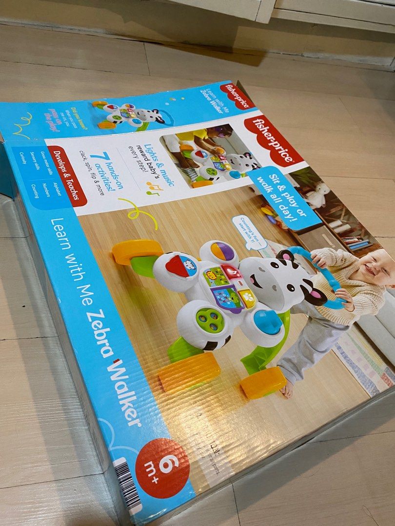 Fisher Price Zebra Walker (Category: Infant Playtime) located in Quezon City. Submitted by jaaammmp (Listing ID 1326114025, Image 2). Description: With box Received as a gift but baby doesn’t want to play with it anymore. Used for around 3 mos (not everyday and very seldom) .