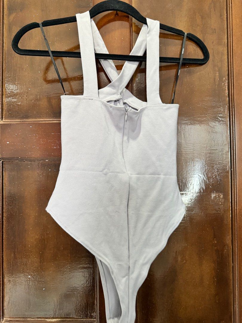 Forever21 crisscross tank bodysuit (Category: Others Tops) located in Pagadian. Submitted by kcmph (Listing ID 1326144177, Image 3). Description: Forever21 crisscross tank bodysuit Size small Euc bought bn Plus sf.