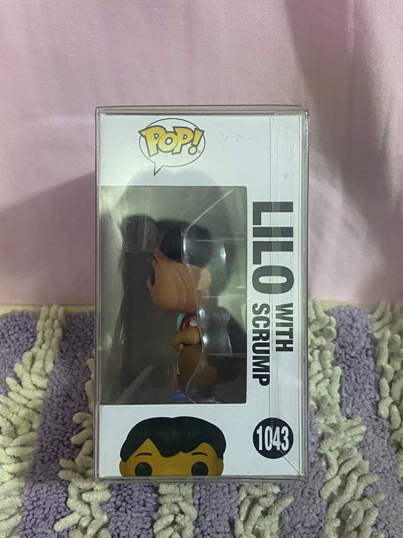 FUNKO POP! Lilo with scrump (1043) (Category: Designer & Blind Box Toys) located in Quezon City. Submitted by kay0821 (Listing ID 1326110362, Image 3). Description: FUNKO POP! Lilo with Scrump 1043 Good as new w/ FREE Boss protective case! For only 1,200PHP (slightly nego) Condition: 10/10 Payment method: Gcash Maya BDO Bank Transfer Shipping method: LALAMOVE GRAB EXPRESS LBC J&T.