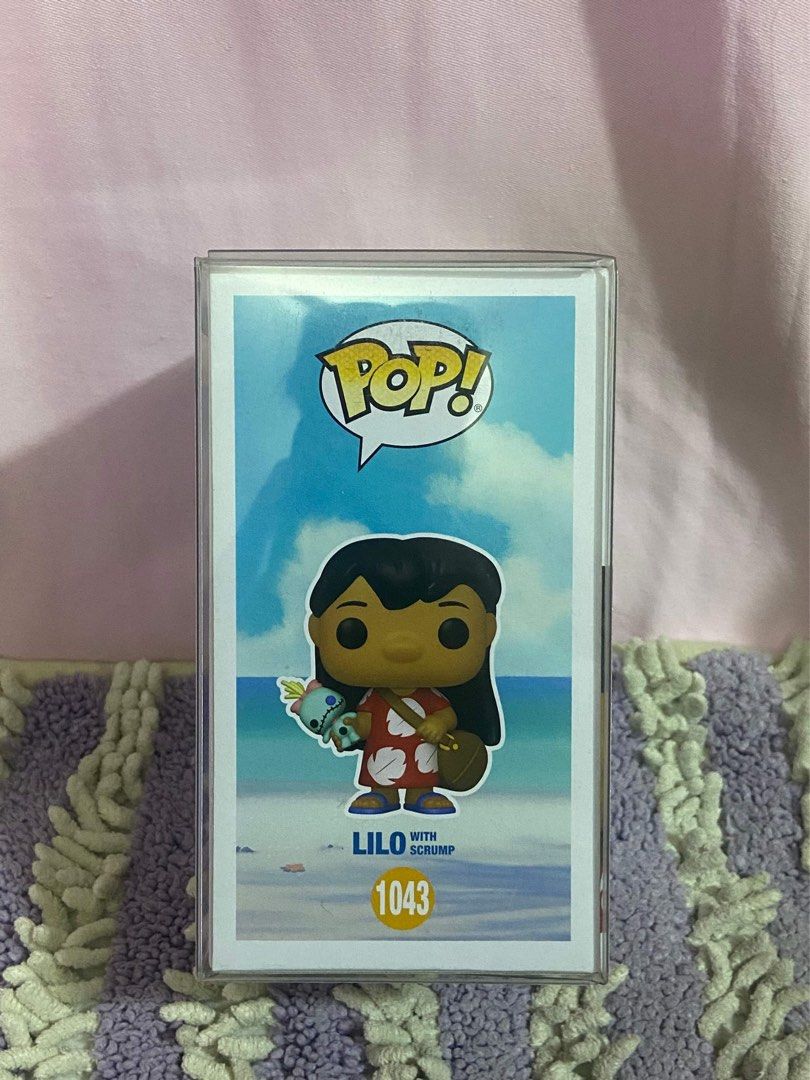 FUNKO POP! Lilo with scrump (1043) (Category: Designer & Blind Box Toys) located in Quezon City. Submitted by kay0821 (Listing ID 1326110362, Image 2). Description: FUNKO POP! Lilo with Scrump 1043 Good as new w/ FREE Boss protective case! For only 1,200PHP (slightly nego) Condition: 10/10 Payment method: Gcash Maya BDO Bank Transfer Shipping method: LALAMOVE GRAB EXPRESS LBC J&T.