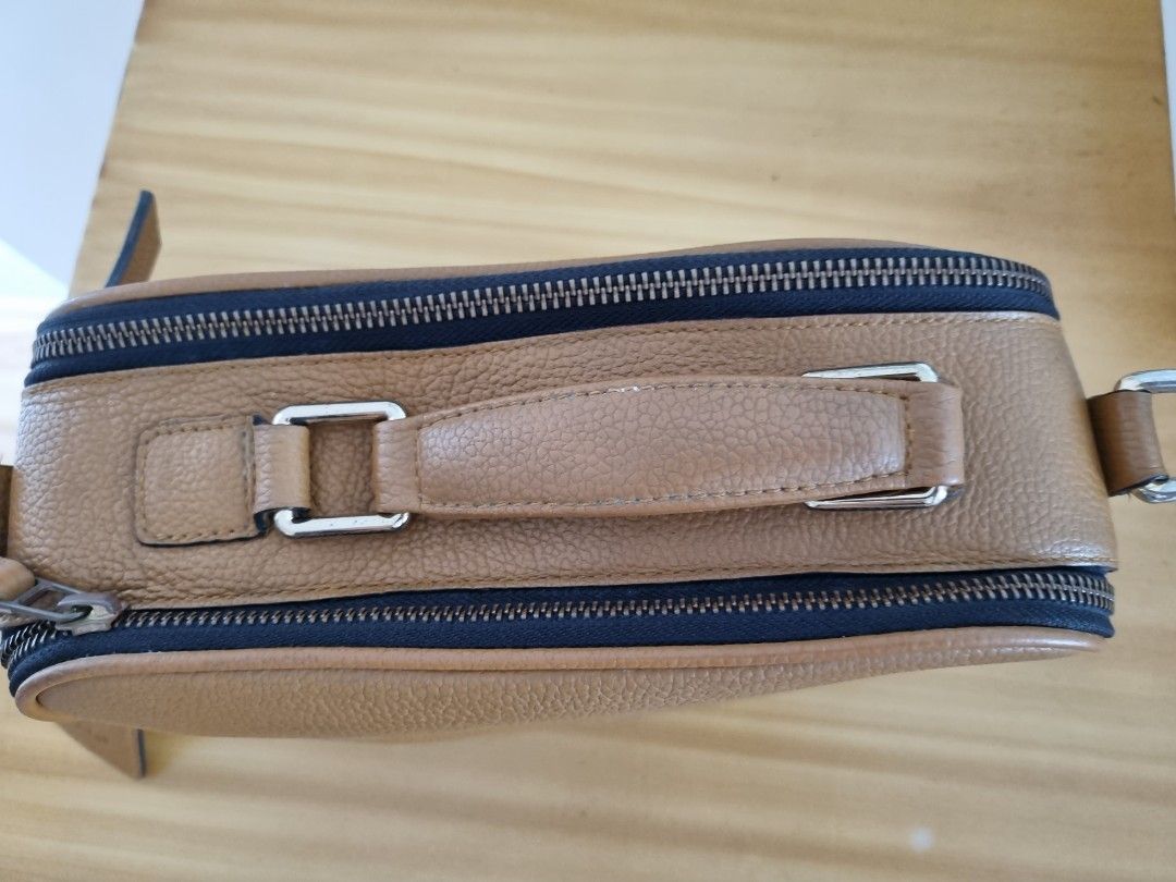 Katre thames camera bag (Category: Cross-body Bags) located in Las Pinas. Submitted by closetful.ph (Listing ID 1325983685, Image 3). Description: VGUC; normal signs if usage; lovely caramel color; genuine leather.