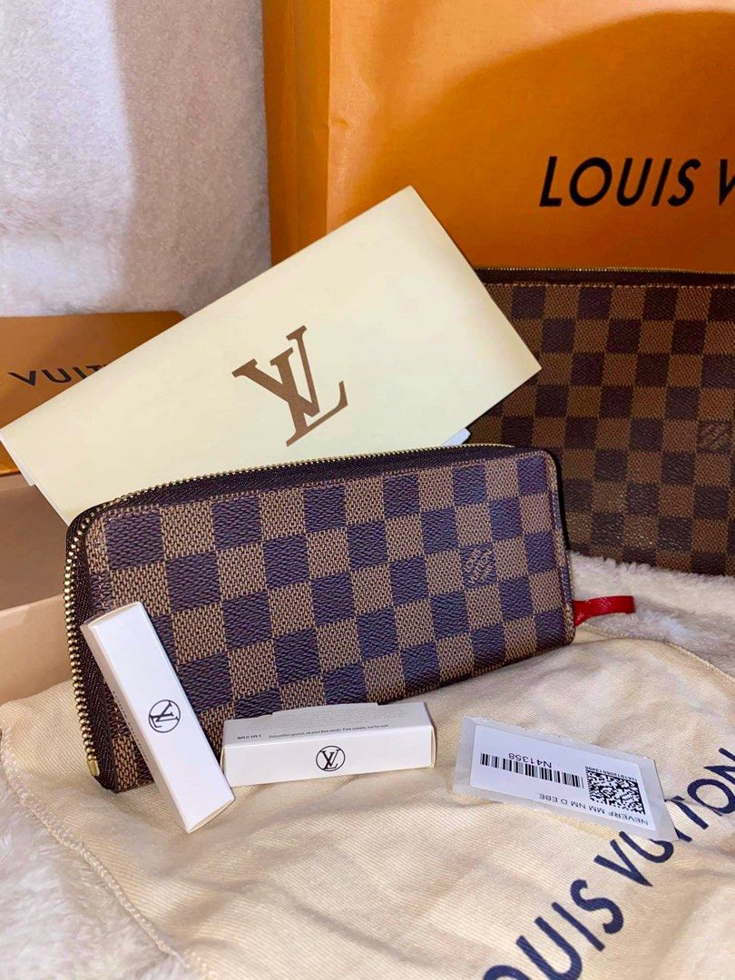 LOUIS VUITTON Clemence (Damier Ebene Canvass) (Category: Luxury Bags & Wallets) located in Iloilo. Submitted by the_pixies (Listing ID 1326015544, Image 1). Description: Clemence Wallet (Damier Ebene Canvass) 💯 Authentic Inclusion: ✅Box ✅Dustbag .