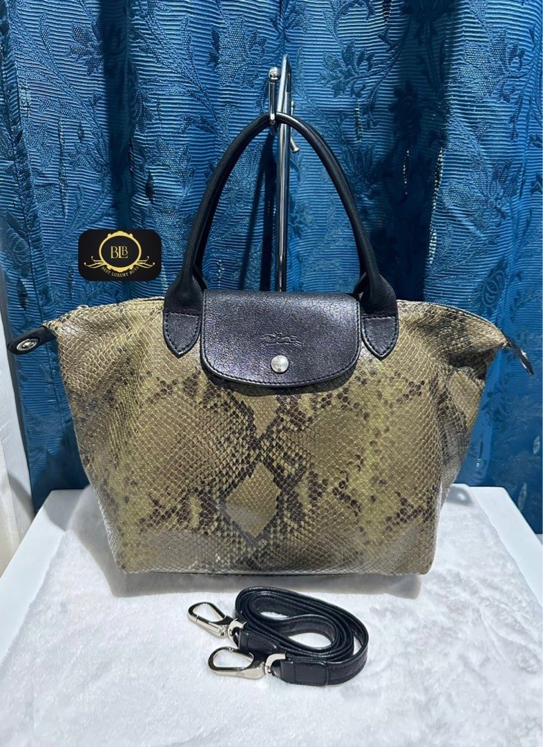 New Authentic Longchamp Neo Python Small Limited Edition Two way Bag (Category: Luxury Bags & Wallets) located in Pasig City. Submitted by bestluxurybuys (Listing ID 1326075829, Image 2). Description: New condition Authentic Longchamp Neo Python Small Limited Edition Two way Bag Dm or Vber O92755II747.