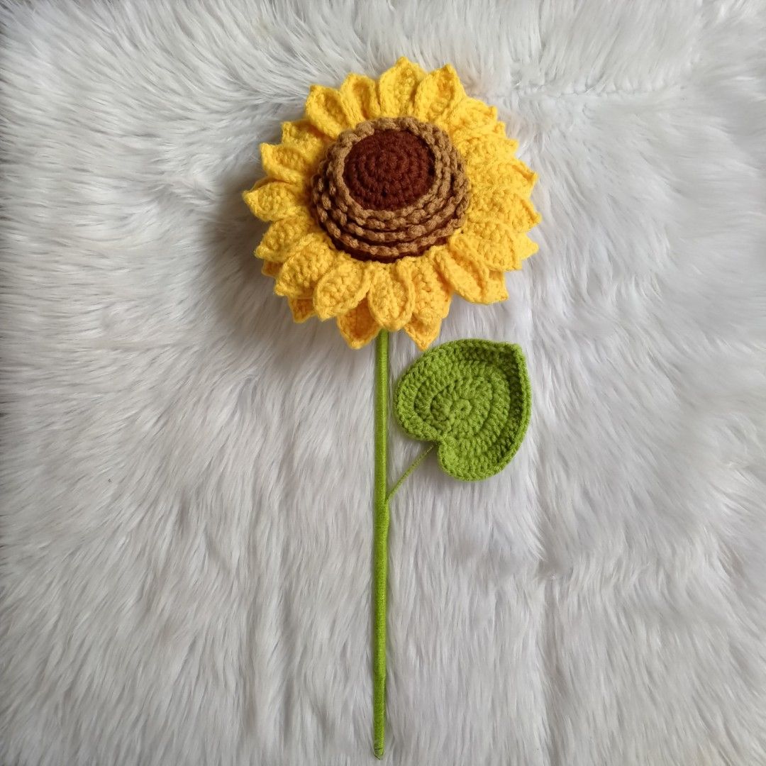 Realistic Sunflower Crochet (per stem) (Category: Flowers & Bouquets) located in Manila. Submitted by janna_rae (Listing ID 1325986101, Image 1). Description: SIZE: Length: 37 cm Width of sunflower head: 15 cm Color: customizable Add ons: Vintage wrapper - 50 Flower plastic bag - 30 Box - 20 Fairy Lights - 20 Two tone wrapper - 50 Letter - 10 Note: You can request for bouquet arrangement.