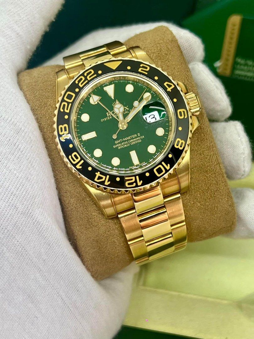 rolex solid yellow gold (Category: Luxury Watches) located in Cabanatuan. Submitted by albertgonzales27 (Listing ID 1326027058, Image 3). Description: GMT Master II Money Green 50th Anniversary Reference number 116718LN 2008 Year model, Foreign AD 40mm case size 18ct Solid yellow gold Ceramic bezel Discontinued model / Rare collectible piece 9/10 watch condition Complete full set Trades accepted up or down P2,260,000 only call 09275402218.