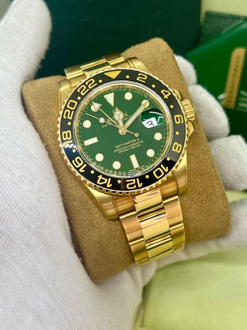 rolex solid yellow gold (Category: Luxury Watches) located in Cabanatuan. Submitted by albertgonzales27 (Listing ID 1326027058, Image 2). Description: GMT Master II Money Green 50th Anniversary Reference number 116718LN 2008 Year model, Foreign AD 40mm case size 18ct Solid yellow gold Ceramic bezel Discontinued model / Rare collectible piece 9/10 watch condition Complete full set Trades accepted up or down P2,260,000 only call 09275402218.