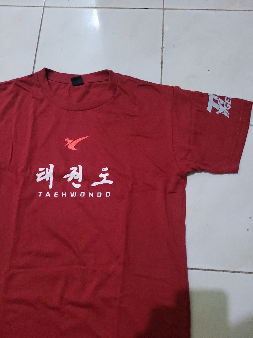 TKD Gear red taekwondo shirt (Category: Tshirts & Polo Shirts ) located in Makati City. Submitted by austinjon (Listing ID 1326055709, Image 2). Description: 📣 60% cotton, 40% polyester. 📏 Measurements (inches) ▫️Length: 26 ▫️Chest: 18 ▫️Sleeve length: 7 ▫️Sleeve width: 6.5 RFS: Used once. No longer fits me. Issue/s: None..