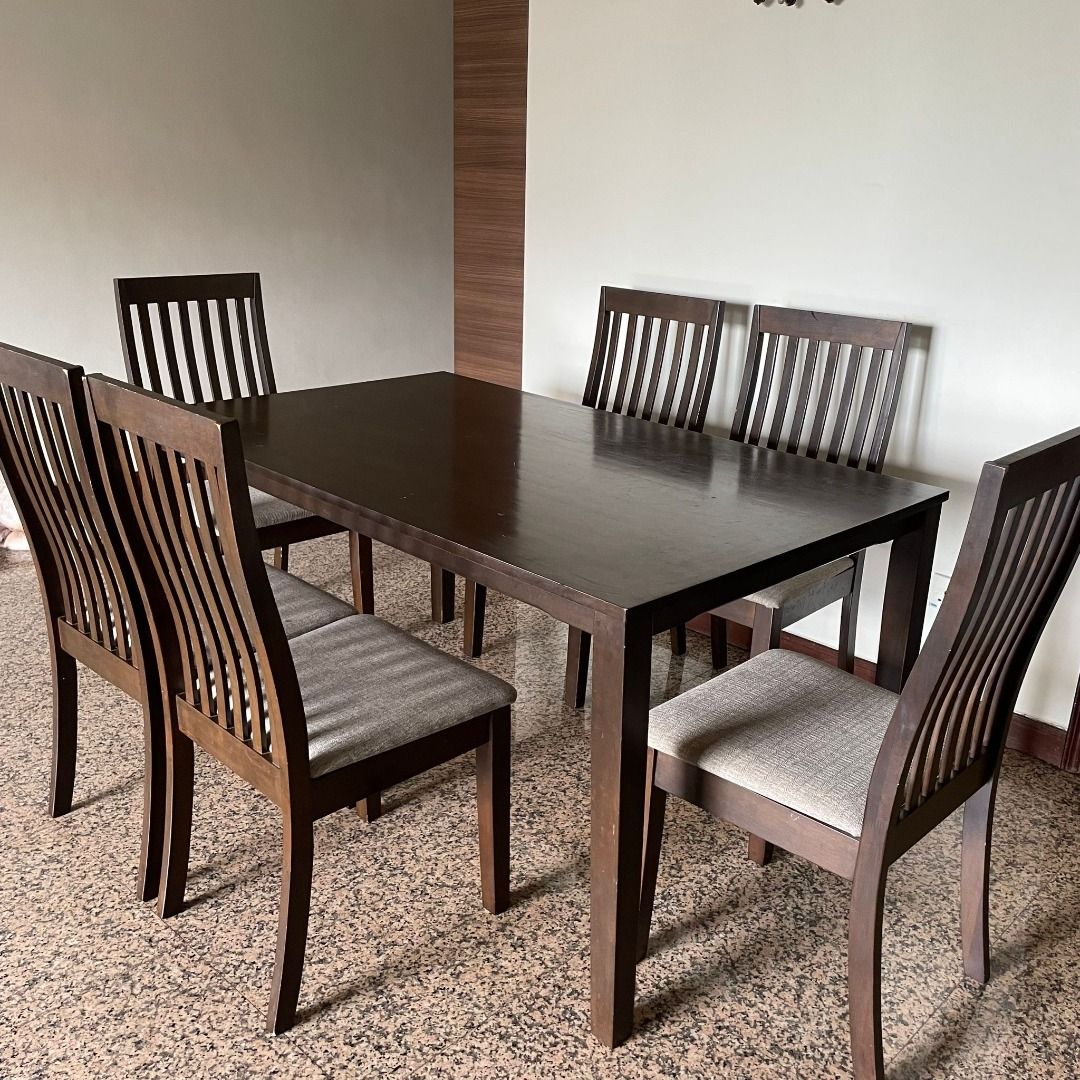 Well used dining table with 6 chairs