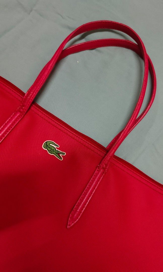 Authentic Lacoste Tote Bag 🌸🩷 (Category: Luxury Bags & Wallets) located in Paranaque City. Submitted by Lourdes (Listing ID 1326292943, Image 2). Description: Decluttering Signs of usage only.