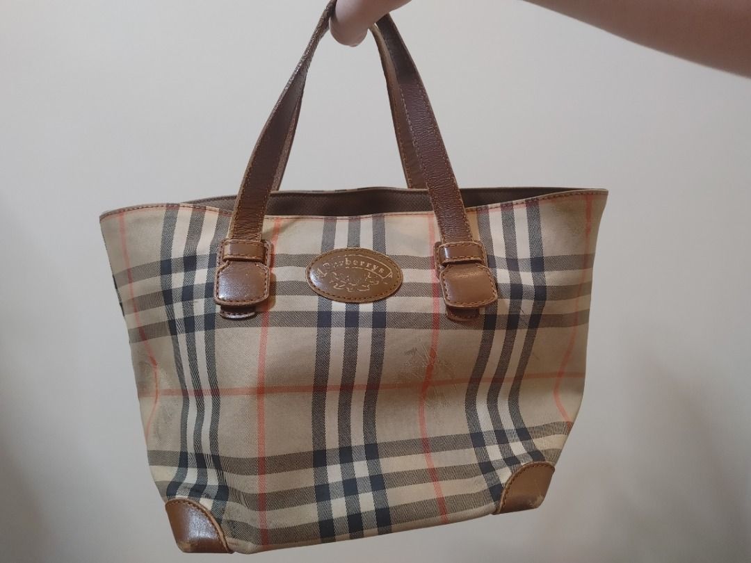 Burberry Nova Check Pattern Logo Embossed Tote Bag (Vintage) (Category: Luxury Bags & Wallets) located in Tagbilaran City. Submitted by k1ngjam (Listing ID 1326311789, Image 2). Description: Guaranteed authentic. Pre-loved. From US.