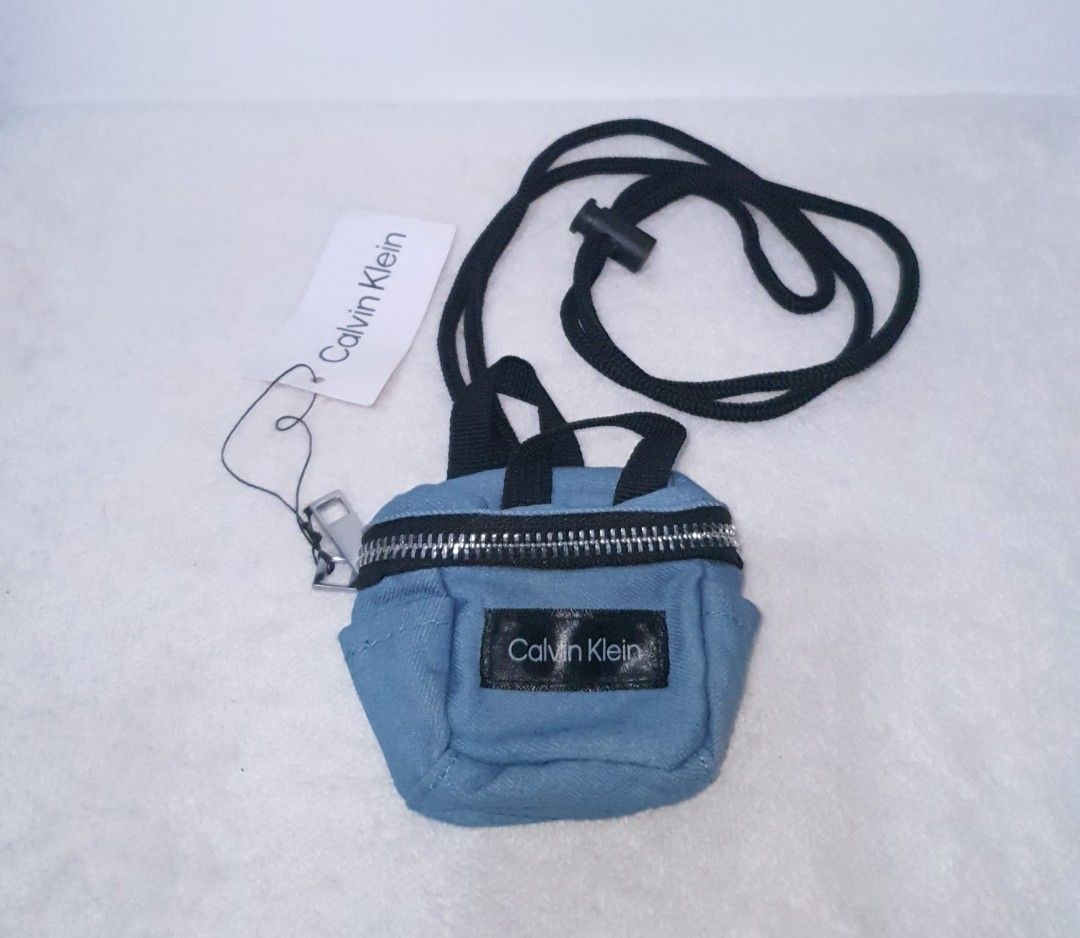 CALVIN KLEIN Micro Mini Crossbody Bag Sling Pouch (Category: Purses & Pouches) located in Baguio. Submitted by missyjhen81 (Listing ID 1326156218, Image 1). Description: 📝📷Products and Photos and Information • Onhand • Actual photos *Product color image may slightly differ due to lighting. 💳Payment Methods • GCASH • Maya • BPI Bank Transfer NOTE: • Make an offer only if you are genuinely interested and capable of completing the purchase. Avoid