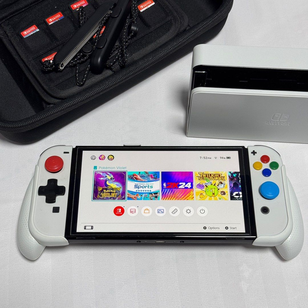 Nintendo Switch Oled White (Category: Nintendo) located in Antipolo. Submitted by iwitchking (Listing ID 1326260613, Image 1). Description: Nintendo Switch Oled Complete Box with same serial number Screen protected, joystick and buttons capped since day one with skull and co accessories. Selling as a package: Nintendo Switch Oled unit + stock dock complete accesories and box Skull and co neo grip and carry case Skull and co portable dock and jump