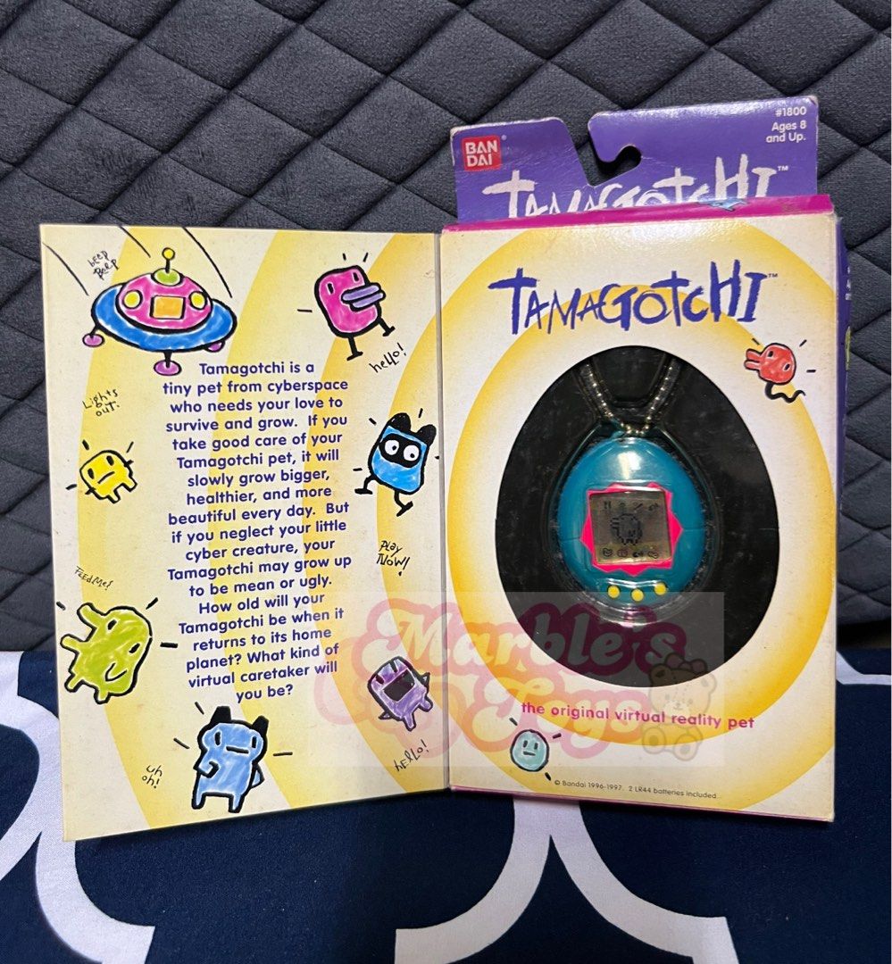 RARE Vintage 1996 1997 Bandai TAMAGOTCHI virtual pet MIB CIB (Category: Others) located in Las Pinas. Submitted by marblestoys (Listing ID 1326308591, Image 2). Description: Working condition Payment via bpi / bdo / gcash / paymaya / COD / COP Shipping fee shouldered by buyer Via flash / j&t / Grab / lalamove Crossposted .