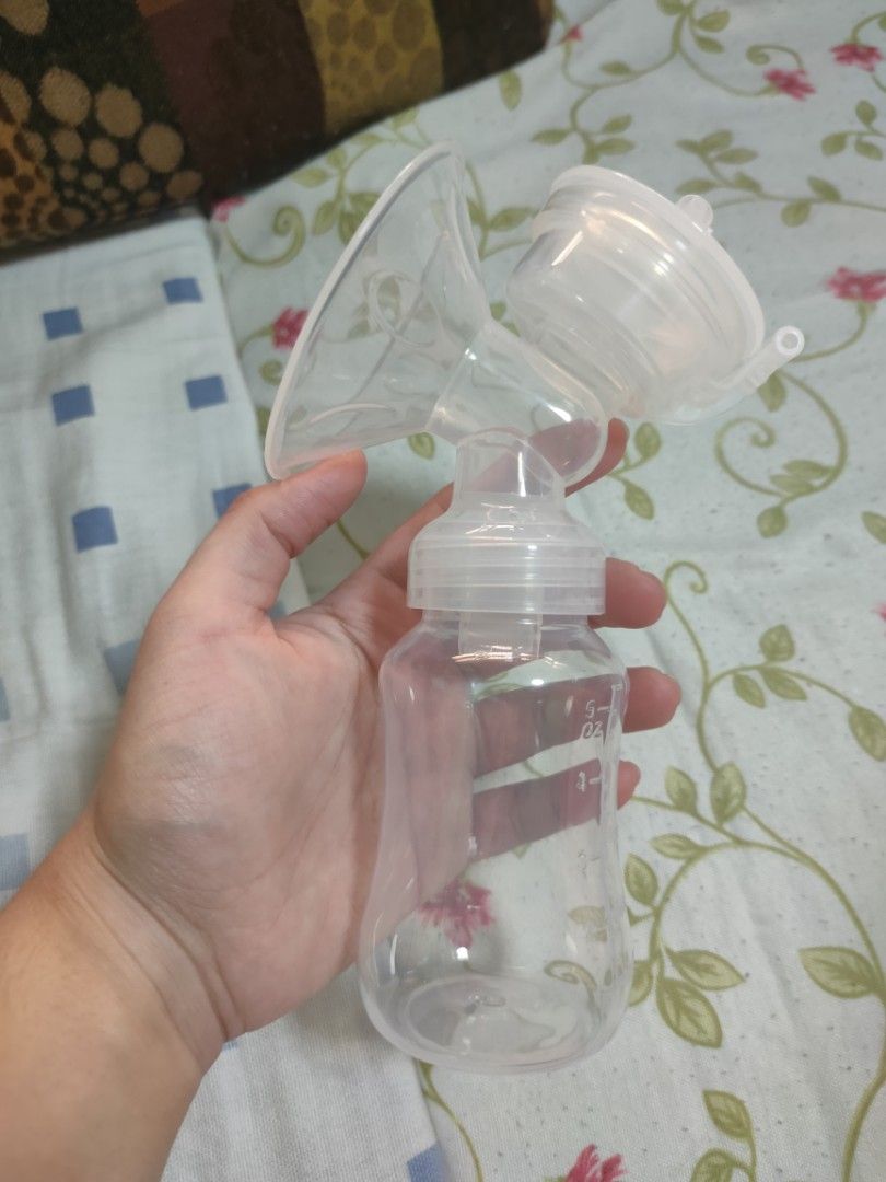 Automatic breast pump / motherlycare brand (Category: Breastfeeding & Bottle Feeding) located in Taguig. Submitted by harhlee (Listing ID 1326367030, Image 2). Description: - single breast pump - seldom used - with massage option - suction strength can be adjusted - with box and manual - low noise - no adapter included. wala talaga kasama nung nabili - with 5 oz / 150 ml bottle pero wala na ung bottle head/nipple. but you can transfer your milk t