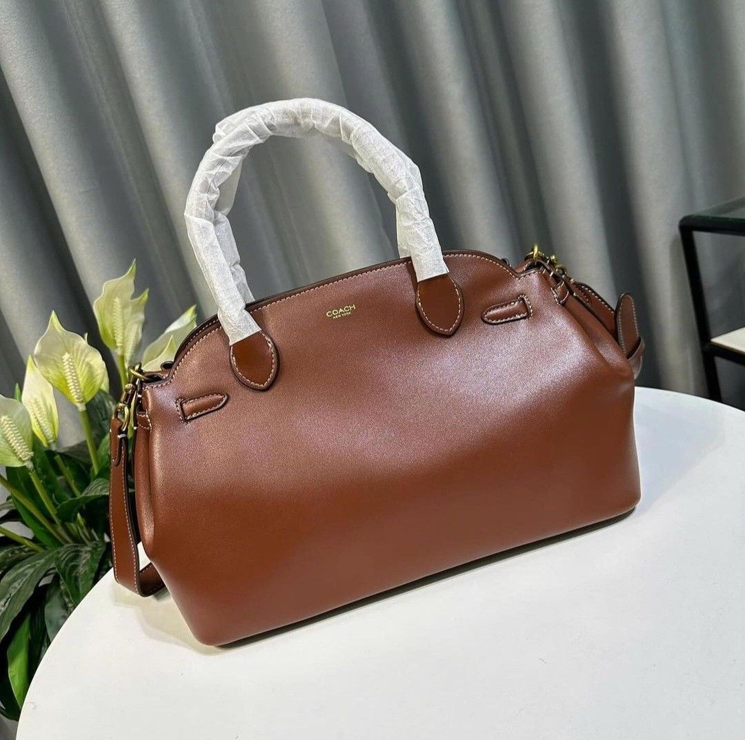 Coach Empire Carryall 28 (Category: Cross-body Bags) located in Quezon City. Submitted by bagsboutiqueph (Listing ID 1326475010, Image 3). Description: LAST PRICE POSTED. LIMITED STOCKS ONLY. NEW ARRIVAL BRANDNEW WITH INCLUSIONS. COLOR MAY SLIGHTLY VARY IN ACTUAL DUE TO LIGHTING AND CAMERA SETTING. OTHER PHOTOS WILL BE SEND DURING PURCHASE AND FOR SURE BUYERS ONLY. WHEN IN DOUBT, DO NOT ORDER. THANK YOU..