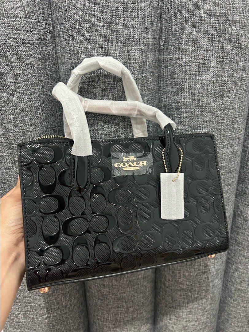 Coach nina caryall ‼️ (Category: Luxury Bags & Wallets) located in Las Pinas. Submitted by yhn_boutique (Listing ID 1326347559, Image 1). Description: Bnew w/ complete inclusions Actual pic posted Sameday delivery thru lalamove Dm .